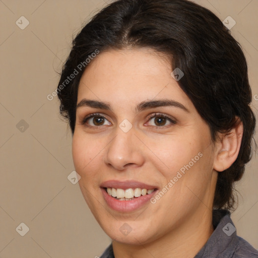 Joyful white adult female with medium  brown hair and brown eyes