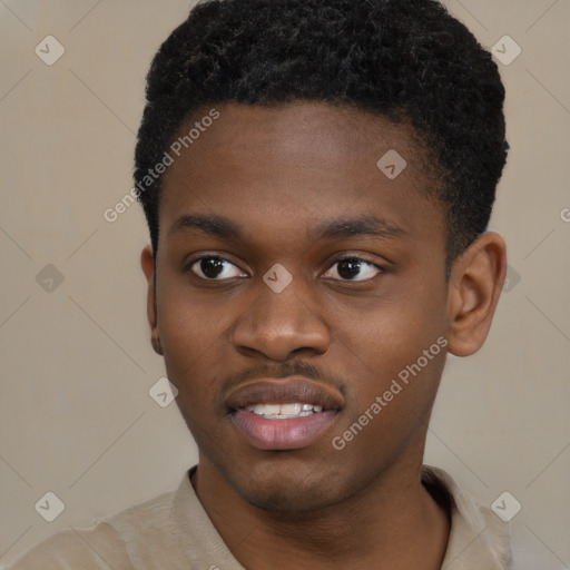 Joyful black young-adult male with short  brown hair and brown eyes