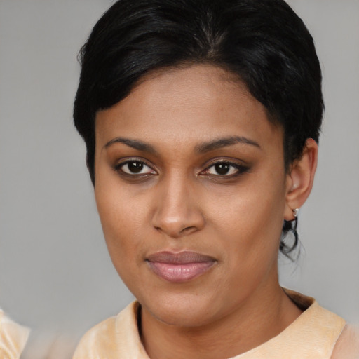 Joyful asian young-adult female with medium  brown hair and brown eyes