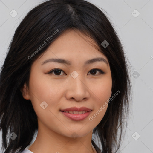 Joyful asian young-adult female with long  brown hair and brown eyes