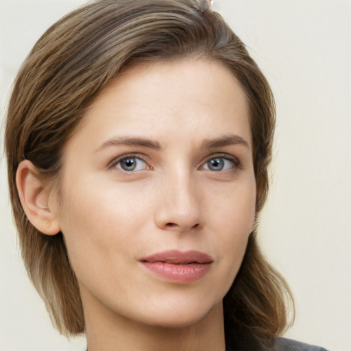 Neutral white young-adult female with medium  brown hair and grey eyes