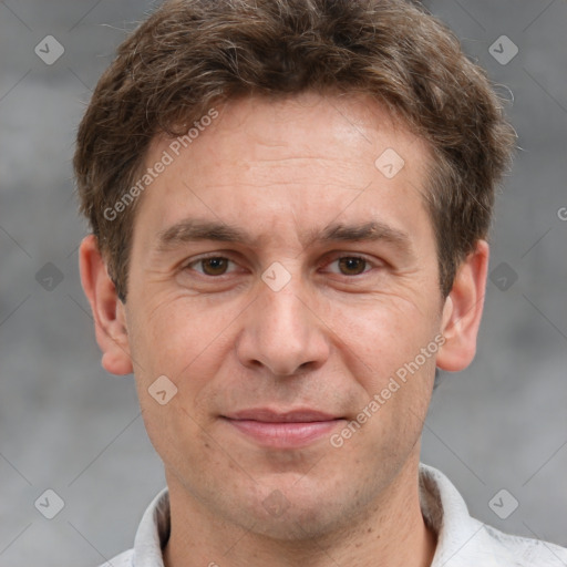 Joyful white adult male with short  brown hair and grey eyes