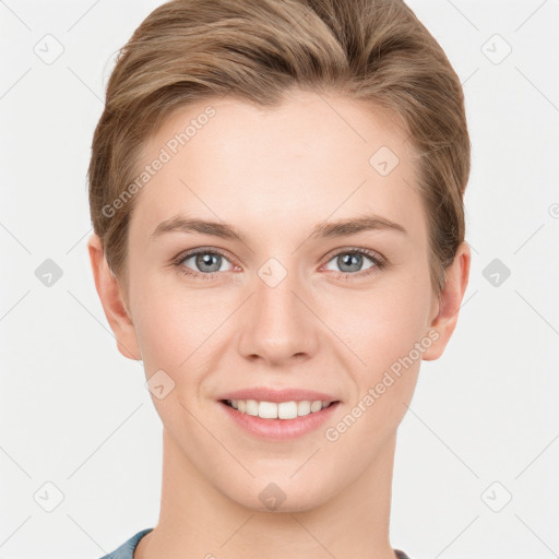 Joyful white young-adult female with short  brown hair and grey eyes