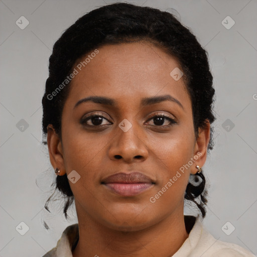 Joyful black young-adult female with medium  brown hair and brown eyes