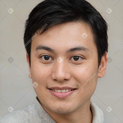 Joyful asian young-adult male with short  brown hair and brown eyes