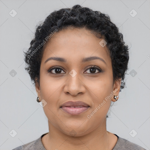 Joyful latino young-adult female with short  black hair and brown eyes