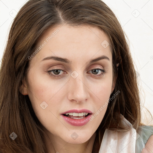 Joyful white young-adult female with long  brown hair and blue eyes