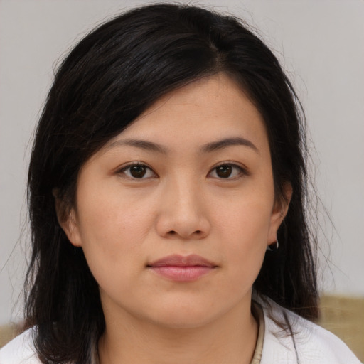 Neutral asian young-adult female with medium  brown hair and brown eyes