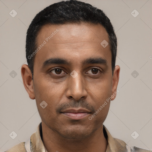 Neutral latino young-adult male with short  black hair and brown eyes