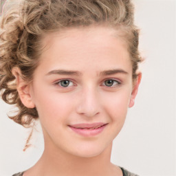 Joyful white child female with medium  brown hair and grey eyes