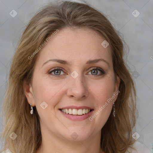 Joyful white young-adult female with medium  brown hair and green eyes