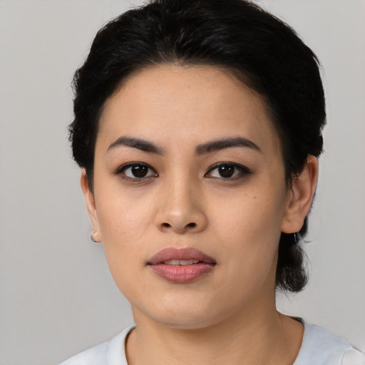 Neutral latino young-adult female with short  black hair and brown eyes