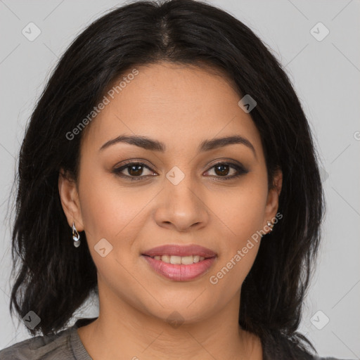 Joyful latino young-adult female with long  brown hair and brown eyes