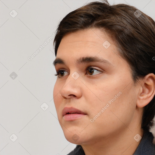 Neutral white young-adult female with short  brown hair and brown eyes