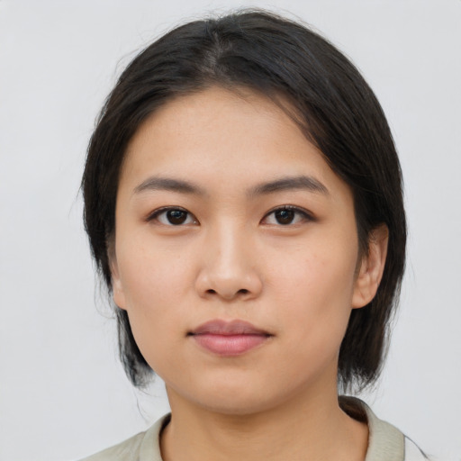 Neutral asian young-adult female with medium  black hair and brown eyes