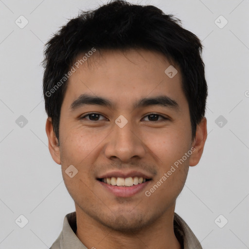 Joyful white young-adult male with short  black hair and brown eyes