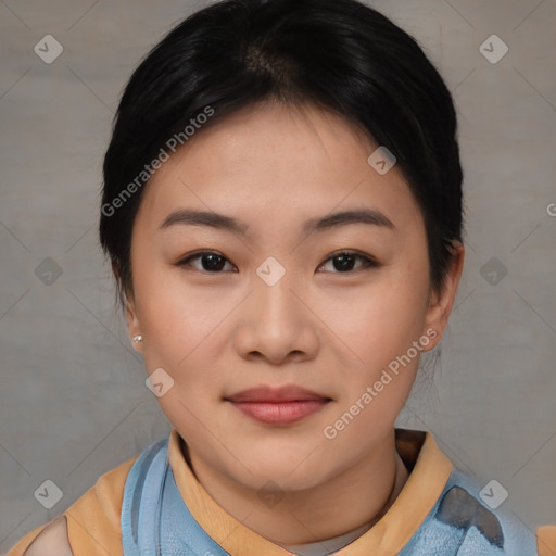 Joyful asian young-adult female with short  brown hair and brown eyes