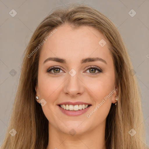 Joyful white young-adult female with long  brown hair and brown eyes