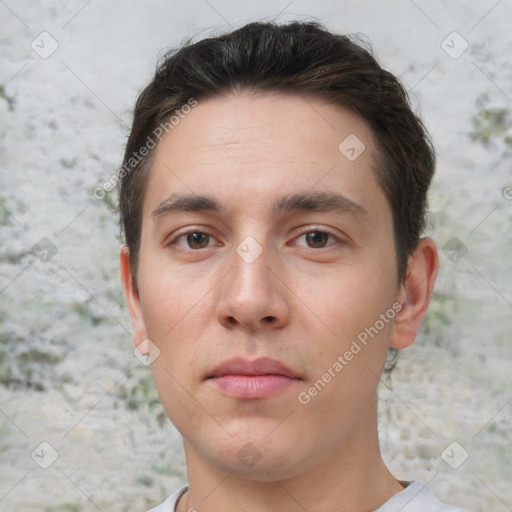 Neutral white young-adult male with short  brown hair and brown eyes