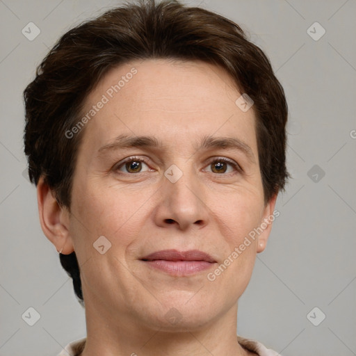 Joyful white adult female with short  brown hair and grey eyes