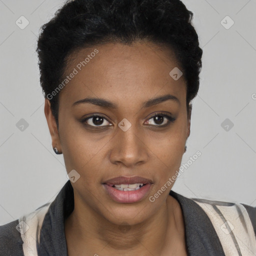 Joyful black young-adult female with short  black hair and brown eyes