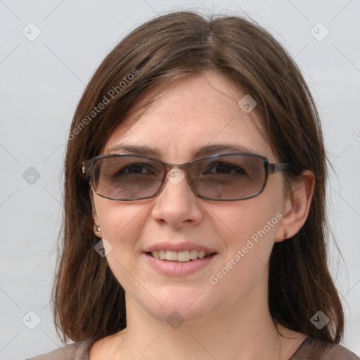 Joyful white young-adult female with medium  brown hair and blue eyes