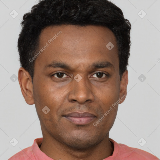 Joyful latino young-adult male with short  brown hair and brown eyes