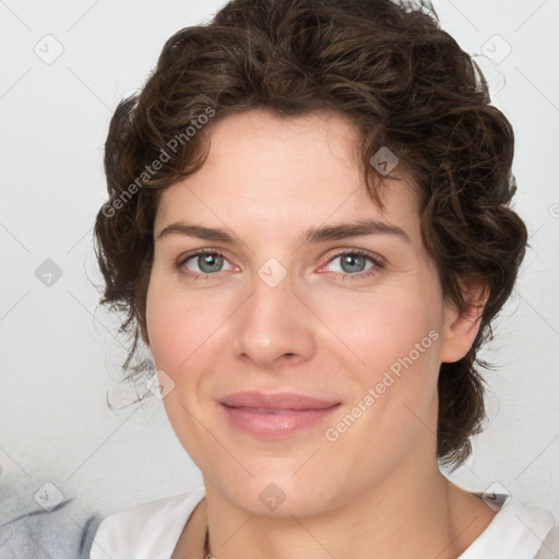 Joyful white young-adult female with medium  brown hair and green eyes