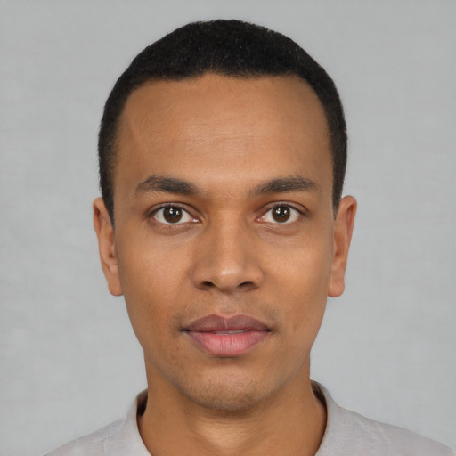 Neutral black young-adult male with short  black hair and brown eyes