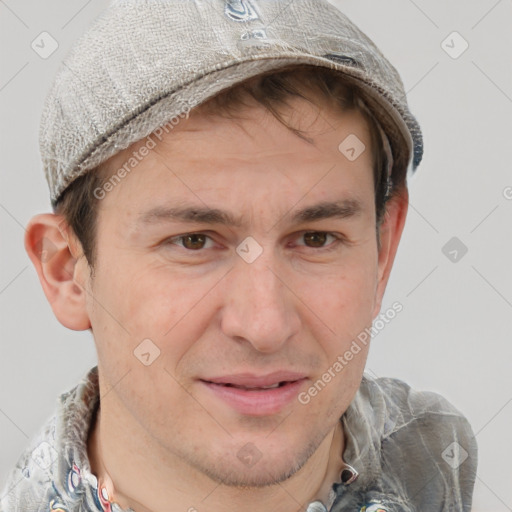 Joyful white adult male with short  brown hair and grey eyes