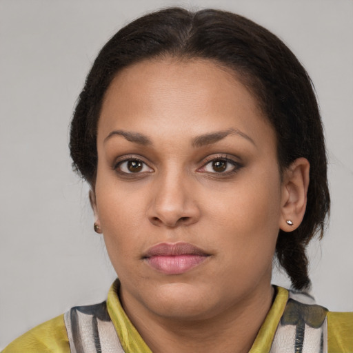 Neutral latino young-adult female with short  brown hair and brown eyes