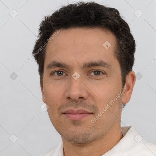 Neutral white adult male with short  brown hair and brown eyes