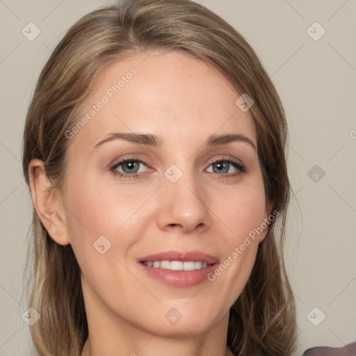 Joyful white adult female with medium  brown hair and grey eyes