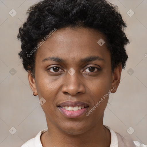 Joyful black young-adult female with short  black hair and brown eyes