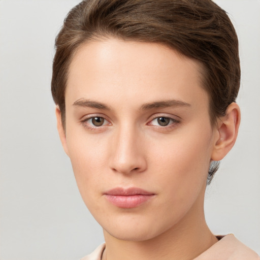 Neutral white young-adult female with short  brown hair and brown eyes