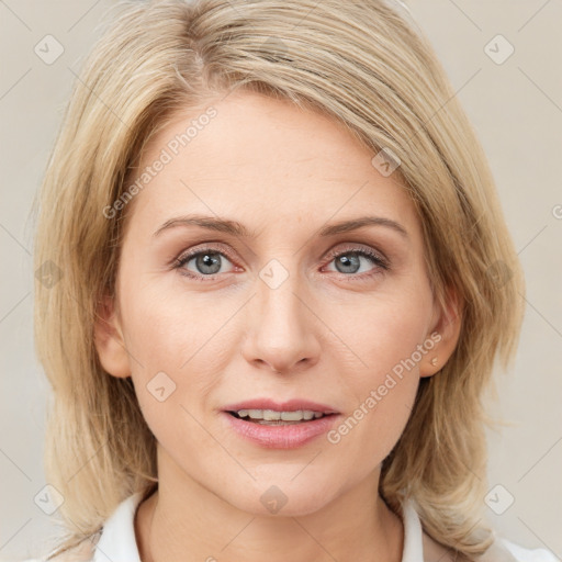 Joyful white young-adult female with medium  brown hair and blue eyes