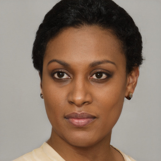 Neutral black young-adult female with short  black hair and brown eyes