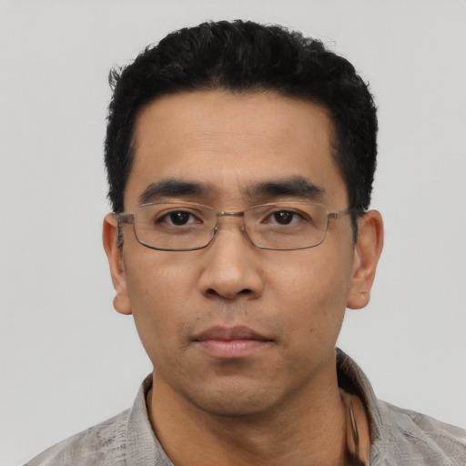 Neutral asian young-adult male with short  black hair and brown eyes