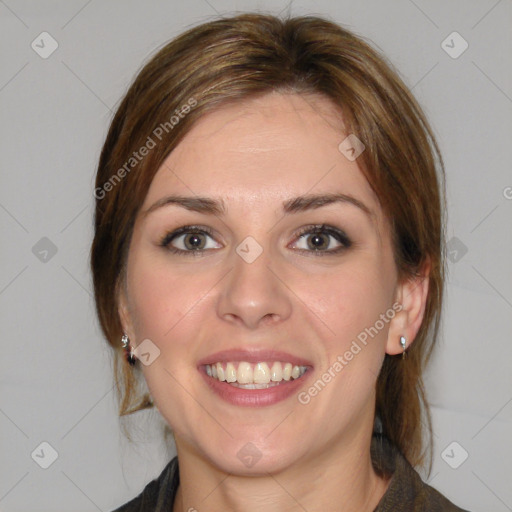 Joyful white young-adult female with medium  brown hair and blue eyes