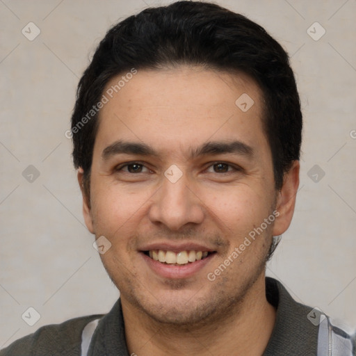 Joyful white young-adult male with short  black hair and brown eyes