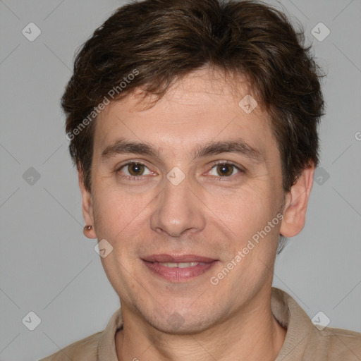 Joyful white adult male with short  brown hair and brown eyes