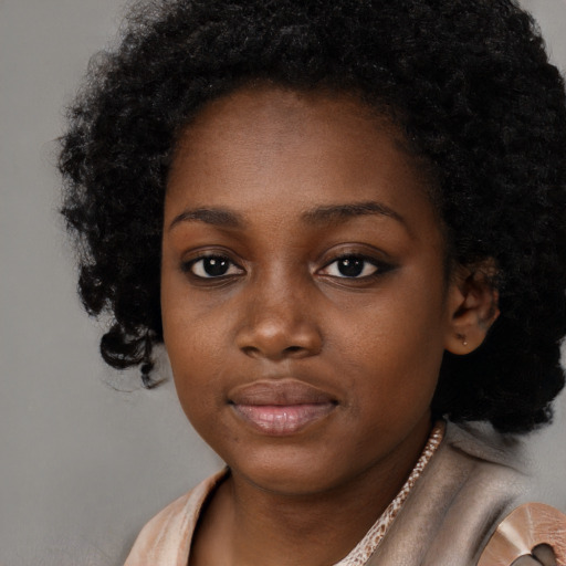Neutral black young-adult female with long  black hair and brown eyes