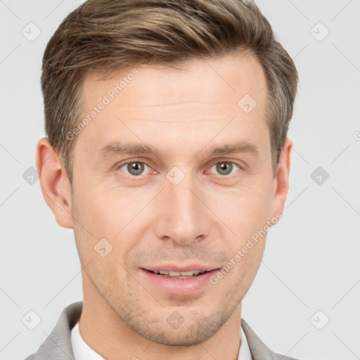 Joyful white young-adult male with short  brown hair and grey eyes