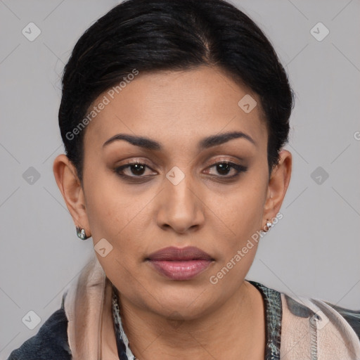 Joyful latino young-adult female with short  black hair and brown eyes