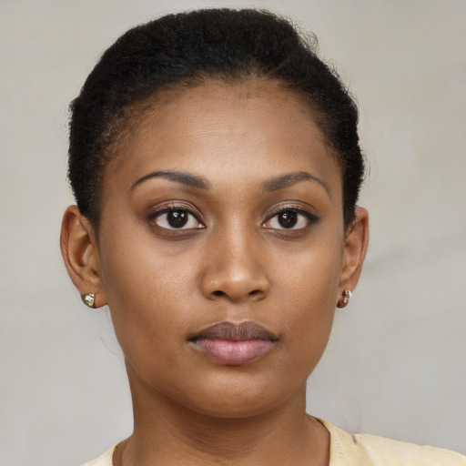 Neutral black young-adult female with short  brown hair and brown eyes
