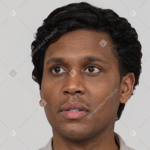 Neutral black young-adult male with short  black hair and brown eyes