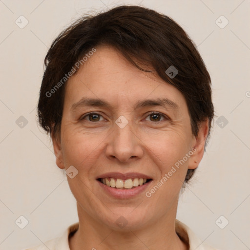 Joyful white adult female with short  brown hair and brown eyes