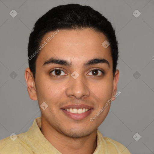 Joyful latino young-adult male with short  black hair and brown eyes