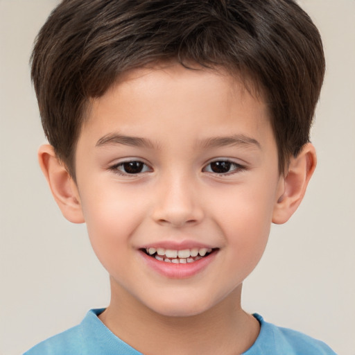 Joyful white child male with short  brown hair and brown eyes