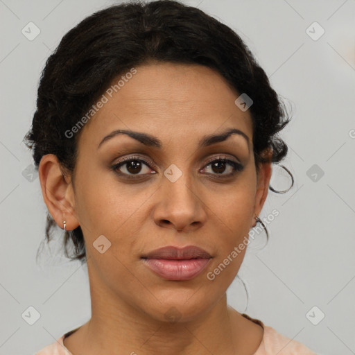 Joyful black young-adult female with medium  brown hair and brown eyes